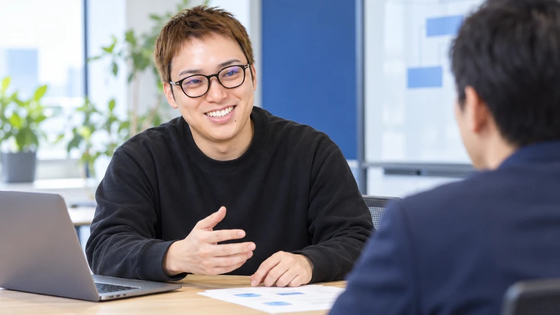 なかじが経営者と向き合って相談に応じる、AI顧問のサービスイメージ(AI生成)